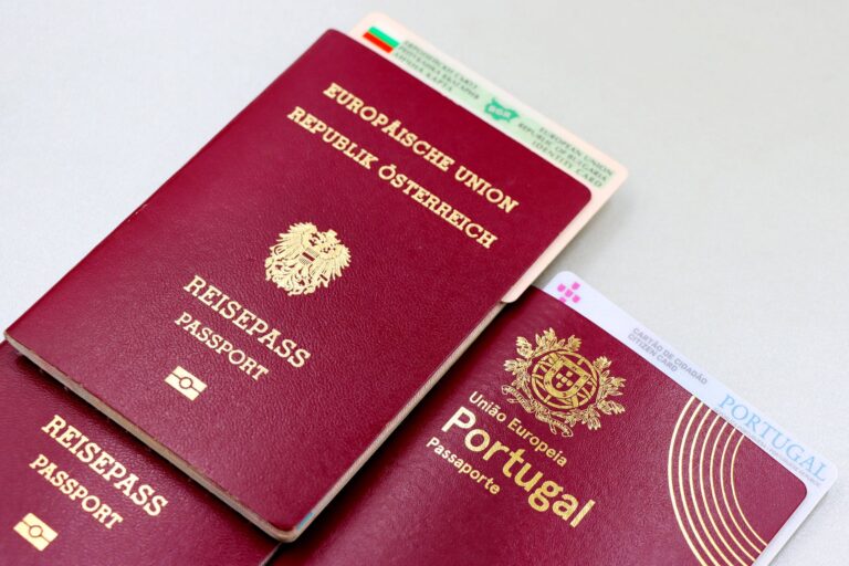 New Zealand passport and visa documentation on a wooden desk