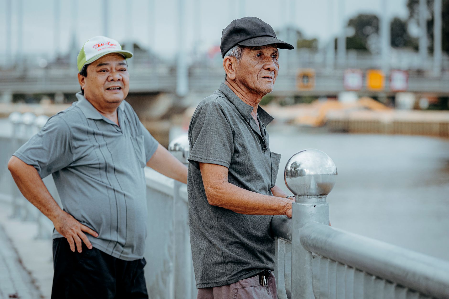A group of diverse senior migrants in New Zealand smiling together, representing New Zealand Superannuation eligibility discussions.