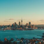 The Auckland skyline and harbour at sunset, with the Sky Tower, New Zealand